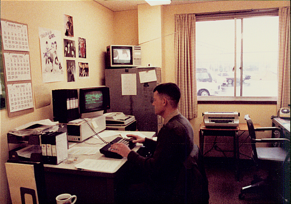 USMC Journalist using computer